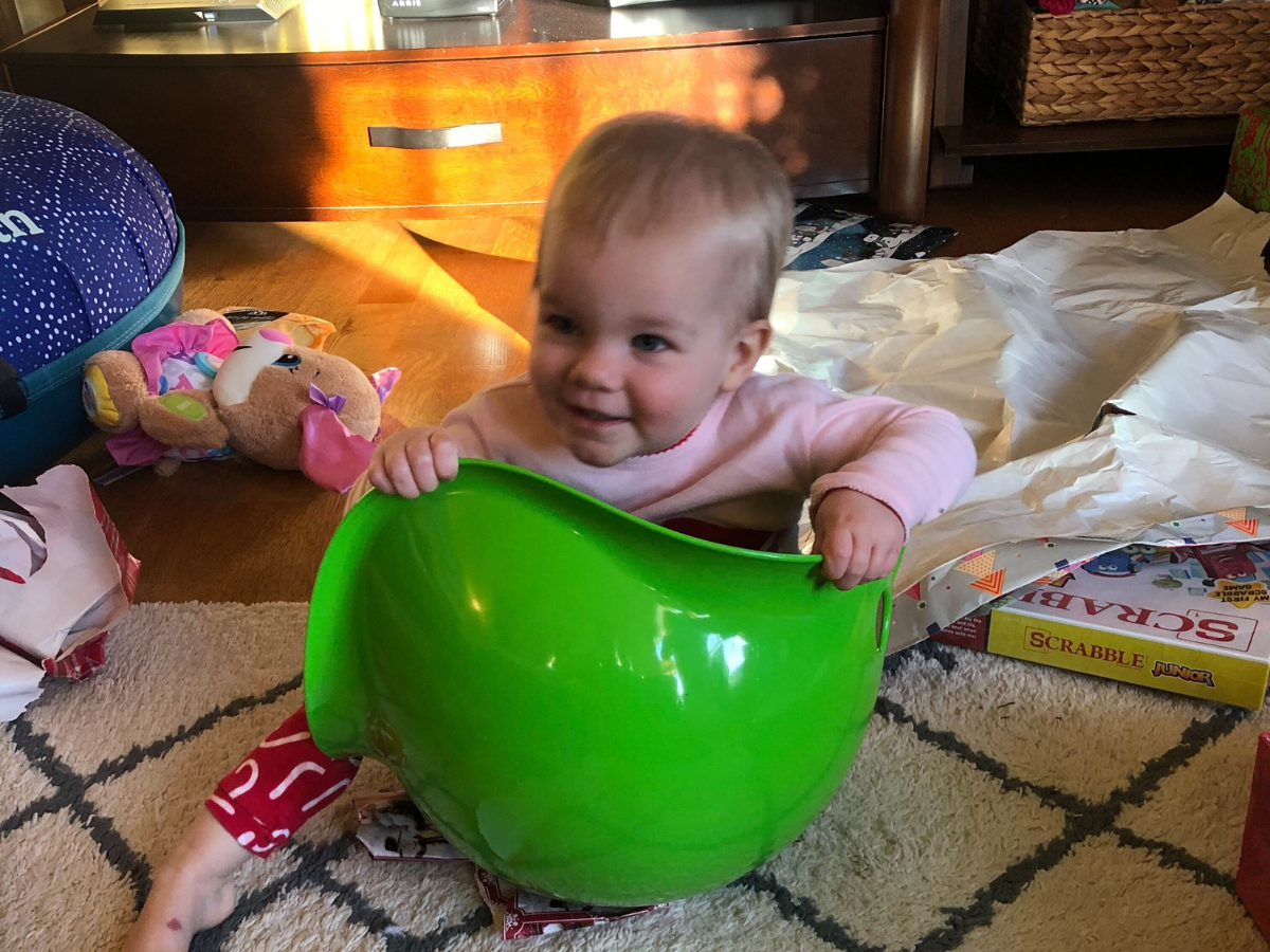 Best indoor active play gifts horizontal 9 Little baby sitting in a green bilibo