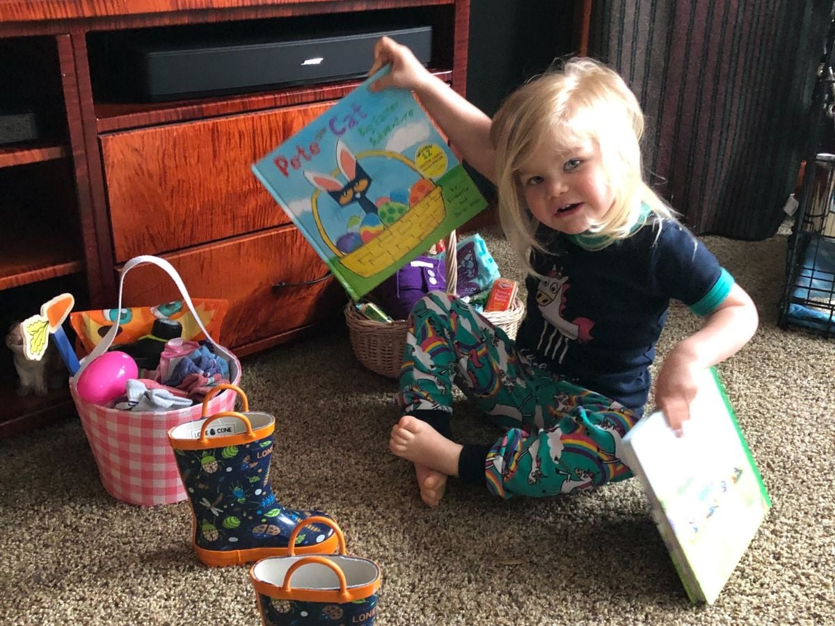 Easter Baskets for Outdoor Kids - Horizontal 2 Little Girl with her easter basket for outdoor kids and her lone cone boots