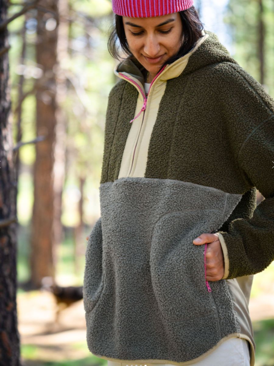 GGOutdoorWomen2025_Life2 A Woman wearing a Title Nine Sawtooth Fleece outdoors.