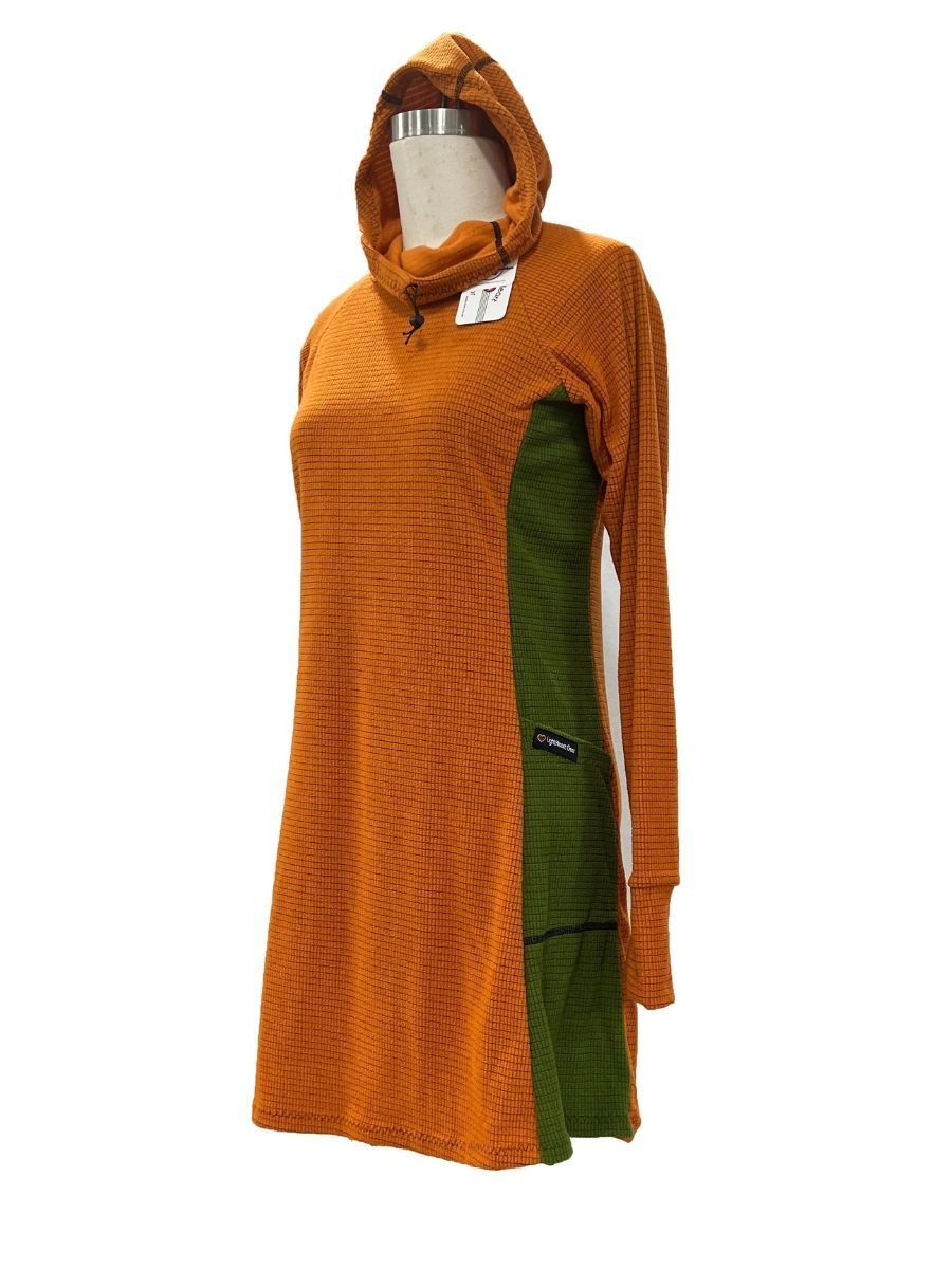 A stock image of a orange dress with hunter green paneling