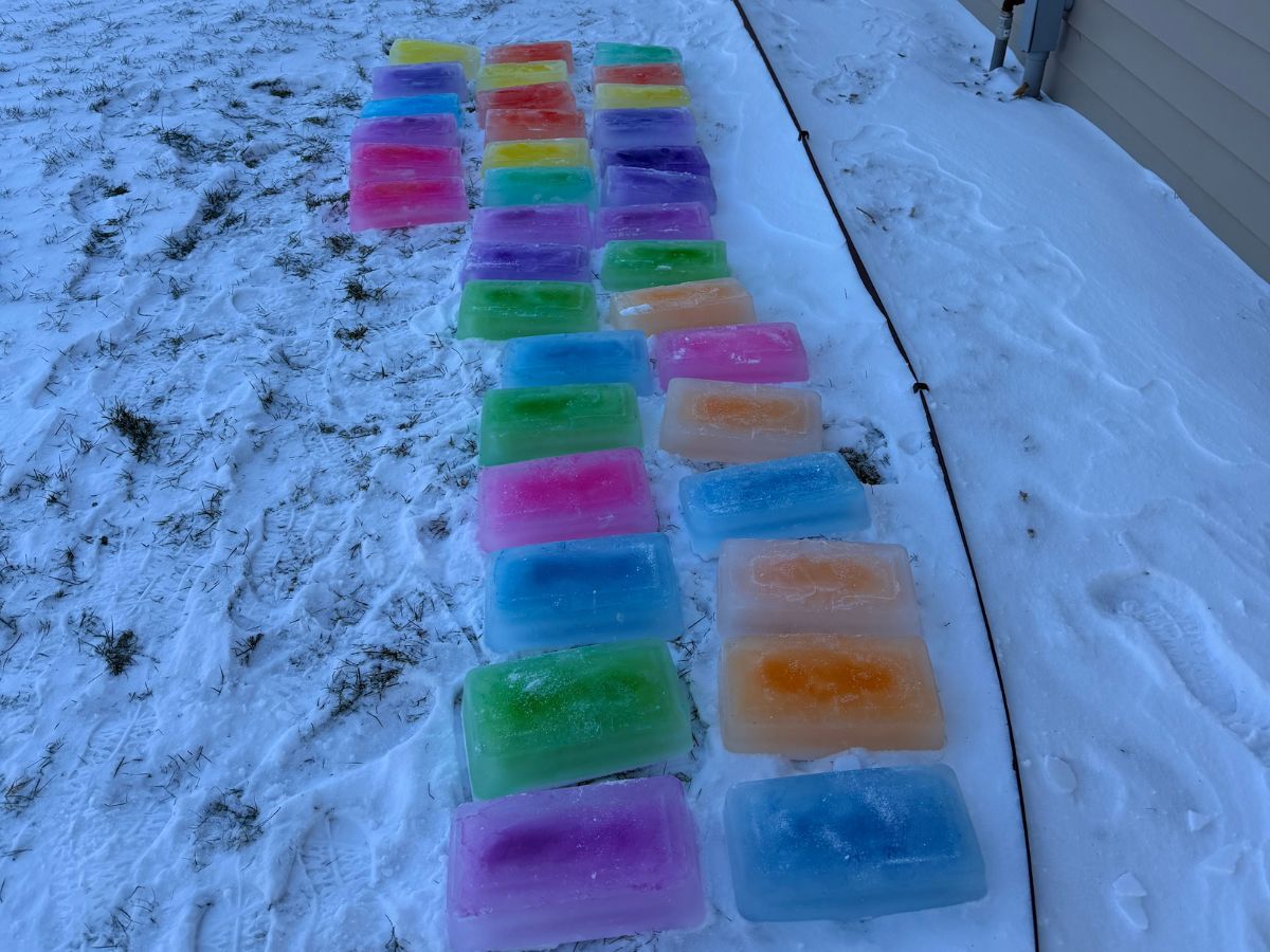 BuildanIceIgloo (8) colorful ice blocks sit on the snow.