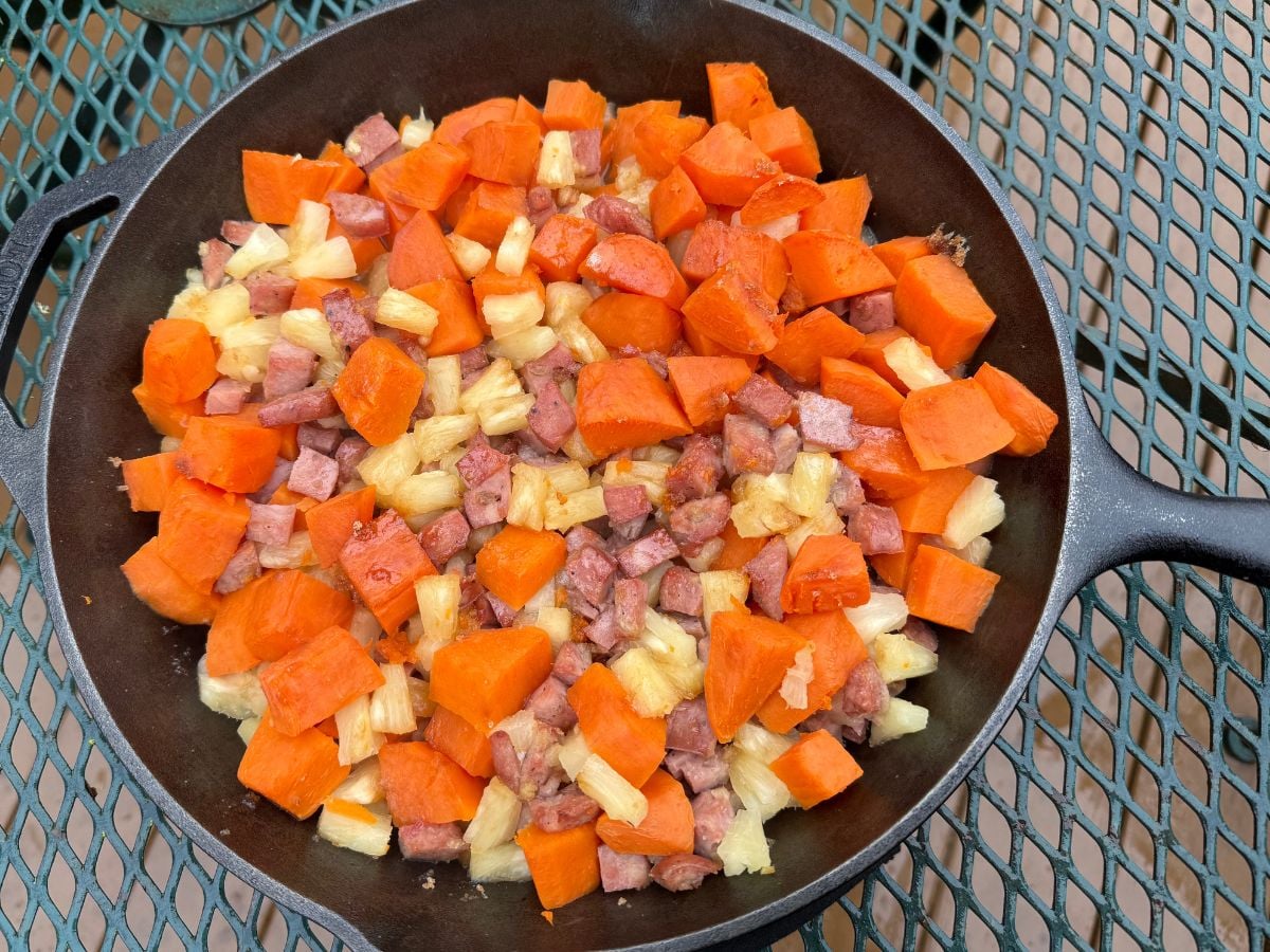 GF Meal Plan 5 Sweet potato, pineapple, and sausage mixed together in a cast iron pan