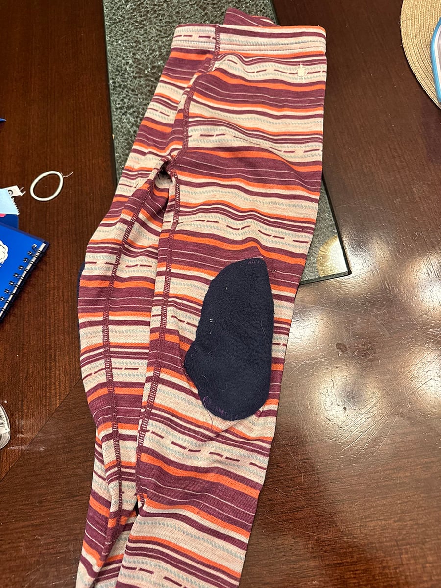 Long underwear pants with fleece patch on the knee.