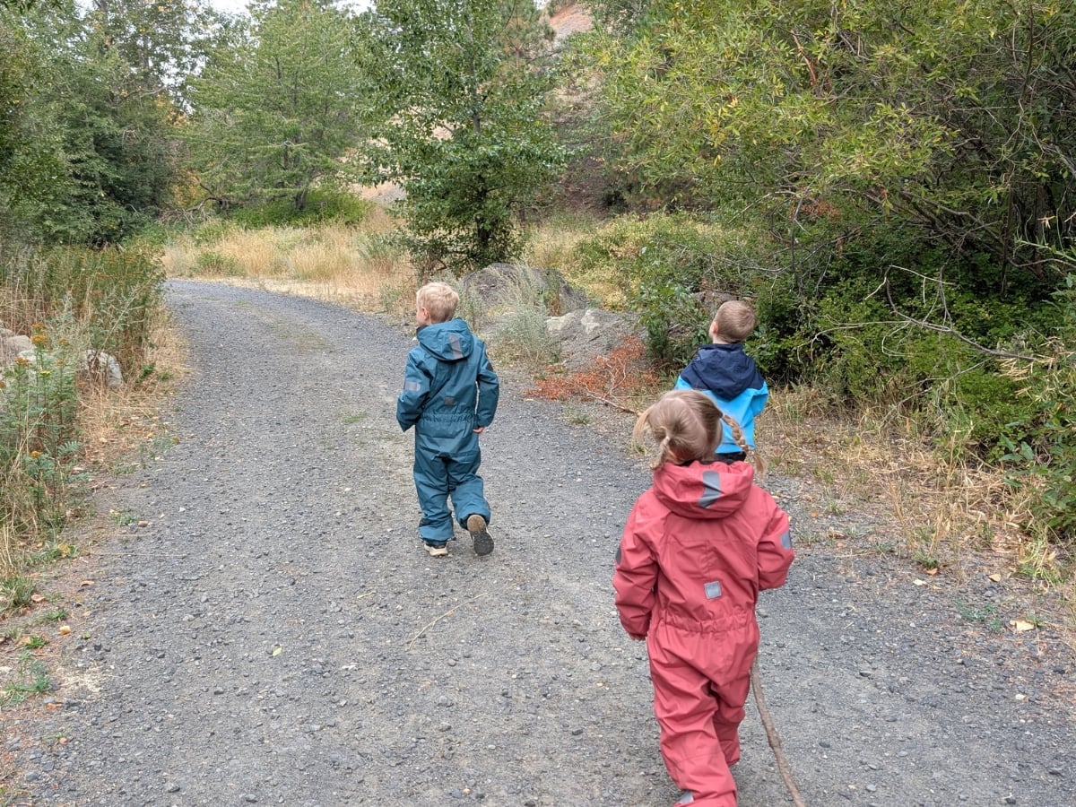 Reima Fall Hiking horizontal 0 Three kids running along a trail in reima fall hiking gear